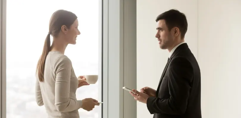 featured image of two people using present continuous tense