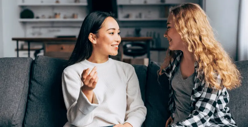 featured image of two people speaking direct and indirect speech