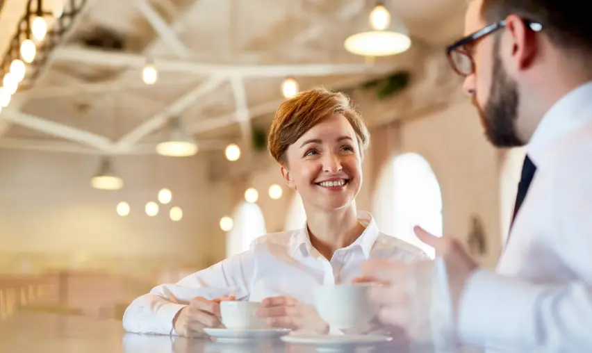 featured image of two person speaking common idioms in english